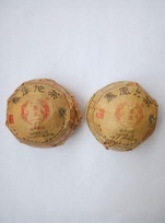 Шу Пуэр (черный) и Шен Пуэр (зеленый)